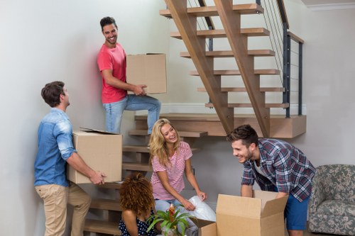 Moving van and boxes for a home move in Harrow
