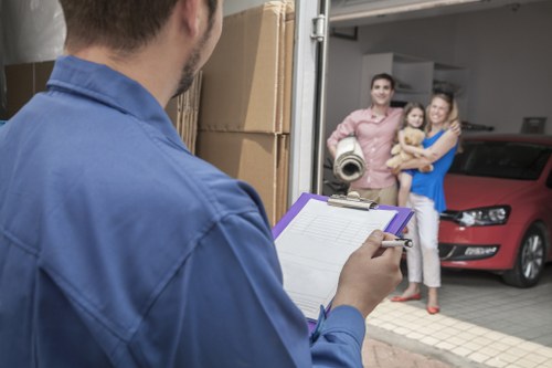 Packed boxes and furniture ready for domestic removals in Harrow
