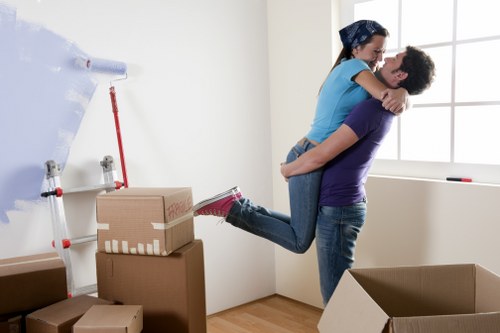 Small moving van loading boxes and furniture for a Harrow home move