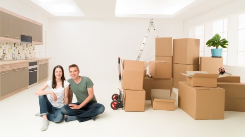 Packed office furniture and business equipment prepared for transport