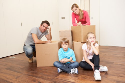 Local removal team handling boxes and household items in Harrow