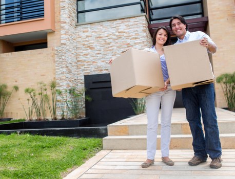 Removal van and packed household items for a Harrow house move